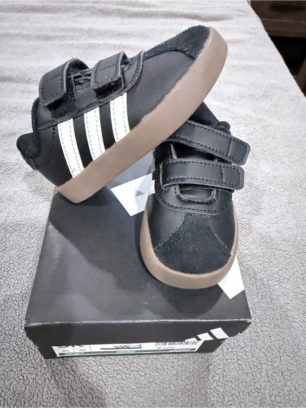 BRAND NEW NEVER USEDadidas Kids Black Sneakers with White Stripes and Brown Sole